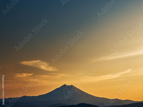Solitary Summit, Single Mountain Silhouette on Gold Gradient Sky. © xKas