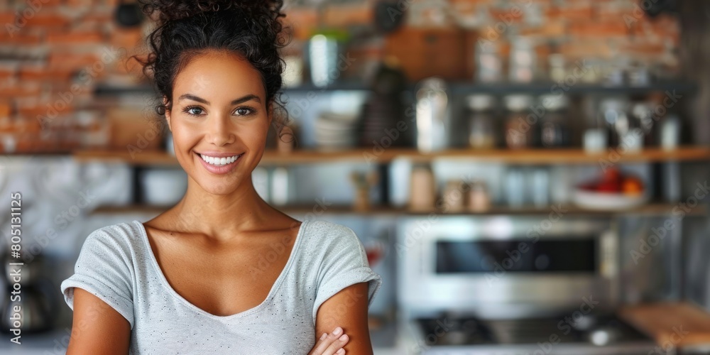 Fototapeta premium Smiling Woman in Kitchen