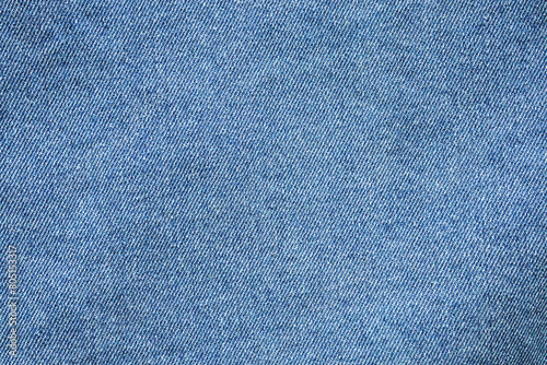 Old denim blue jeans fabric texture background