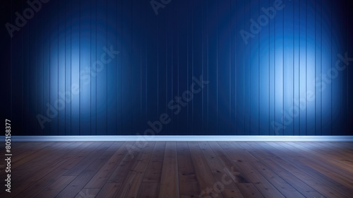 wood floor with dark black wall with blue lighting photo