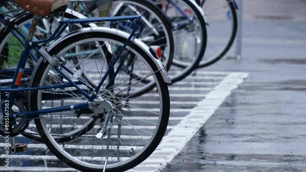 Group of bikes in parking in Japan on a rainy day. Group of bikes in parking in Japan on a rainy day.