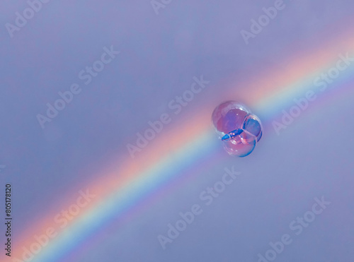 Bubbles of water on a rainbow © danimages