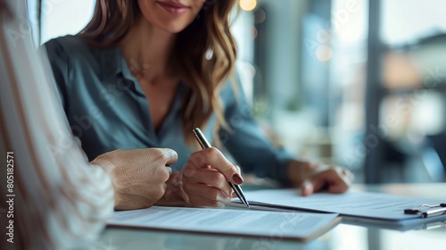 Wallpaper Mural A Real Estate Broker Agent Offers Presentation and Consultation to Customers, Assisting Them in Decision-Making as They Sign Insurance Form Agreements Torontodigital.ca