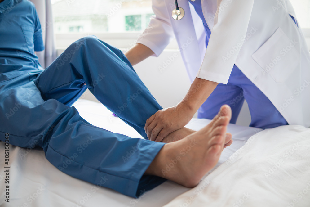 Doctors are examining patient muscle injuries and doing physical therapy for patient to move muscles so they can be used regularly because physical therapy will help strengthen muscles and blood flow. Doctors are examining patient muscle injuries and doing physical therapy for patient to move muscles so they can be used regularly because physical therapy will help strengthen muscles and blood flow.