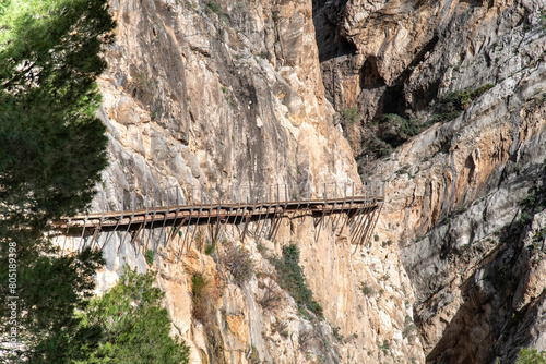 Pathway of El Caminito del Rey (The King's Little Path) near El Chorro, Malaga, Spain, pinned along the steep walls of a narrow gorge in mountain ranges of Baetic System in southern Iberian Peninsula
