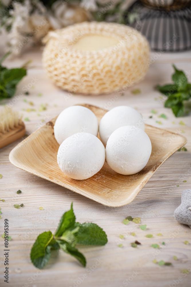 Fresh bath bombs on bamboo tray