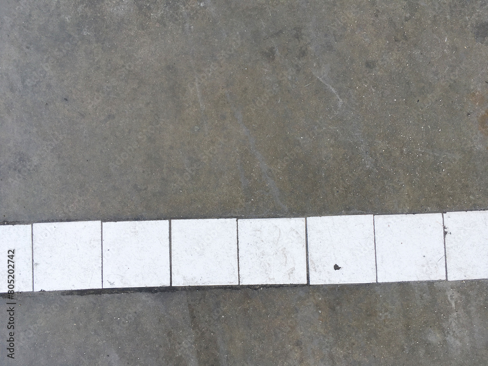 Fototapeta premium white brick floor texture with cement background