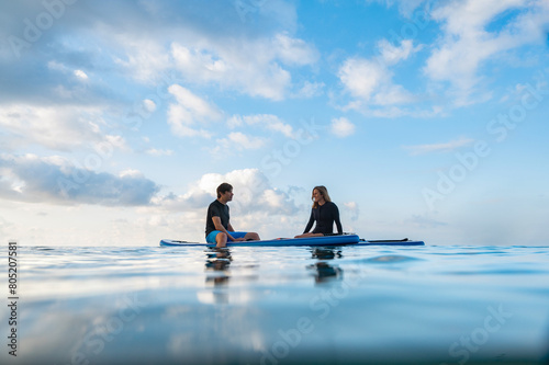 Man, woman, having relaxation time in the sea in spain