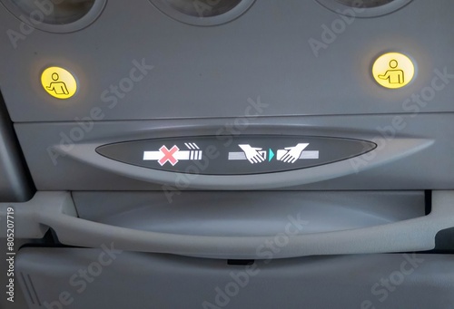 Aircraft seat belt warning light