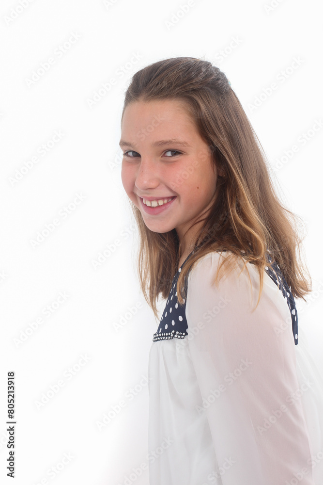 studio portrait of a cheerful preteen girl studio portrait of a cheerful preteen girl