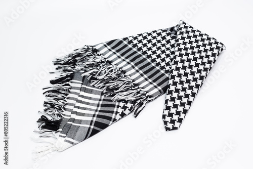 Keffiyeh is a head covering widely used in the Middle East and the Arab World. A traditional pattern head-tied garment is 'Keffiyeh' or 'Pushi'.