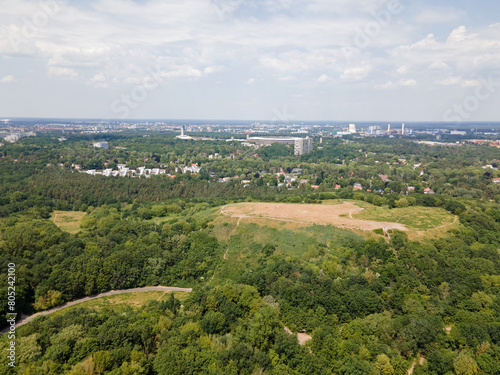Aerial landscape of Grunewald forest and city skyline on a sunny day in Berlin © Andrew