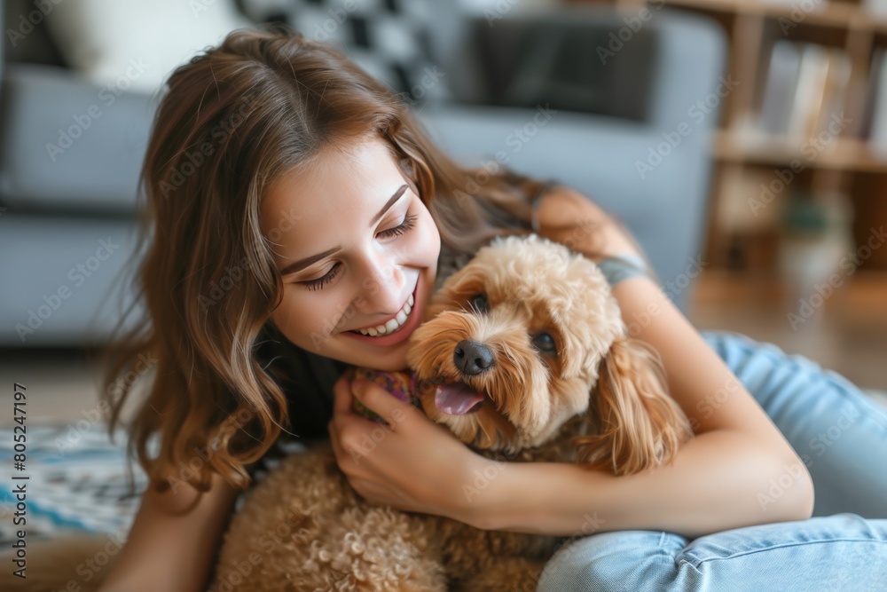 Fluffy dog biting new toy held by happy owner Fluffy dog biting new toy held by happy owner
