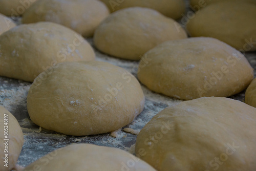 The process of making dough for sweet bread at home. Making buns with flour. The concept of baking bread