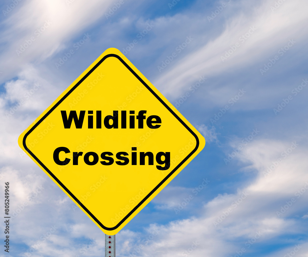 Diamond Shaped Yellow warning sign, Wildlife Crossing caution advisement. Diamond Shaped Yellow warning sign, Wildlife Crossing caution advisement.