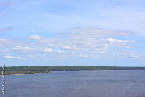 the Volga river with a few clouds in the sky copy space