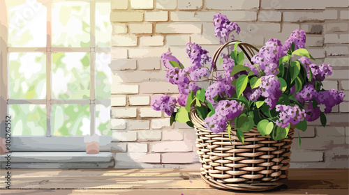 Wicker basket with beautiful lilac flowers on wooden