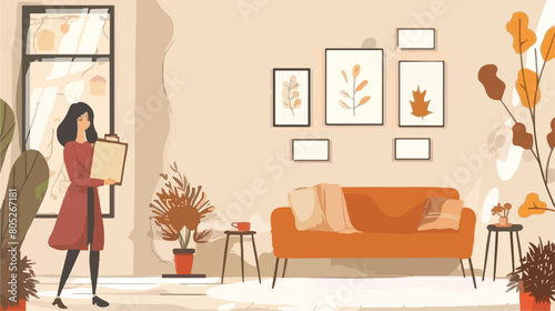 Woman decorating stylish living room with blank frame