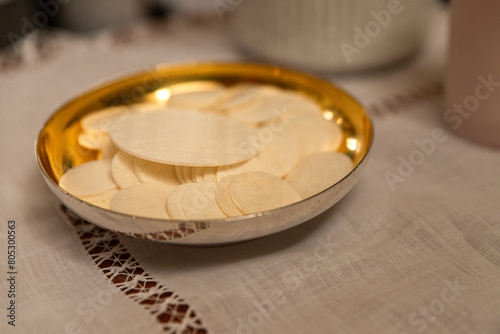 hosts in a paten during a mass celebration