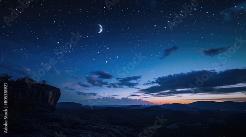 Beautiful night sky with moon and stars over dark landscape