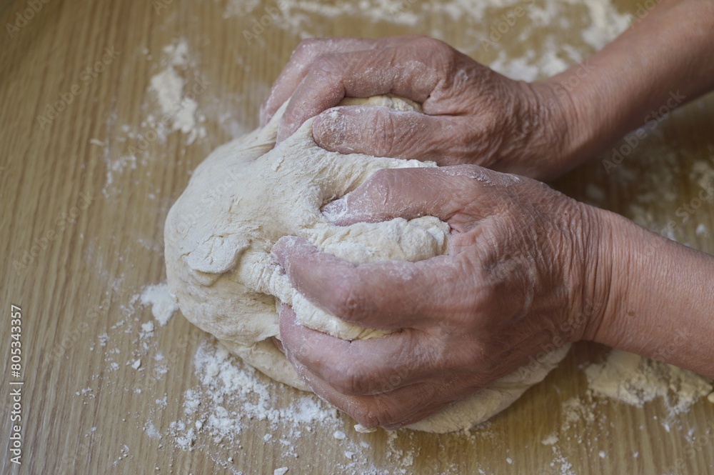 hands kneading dough hands kneading dough