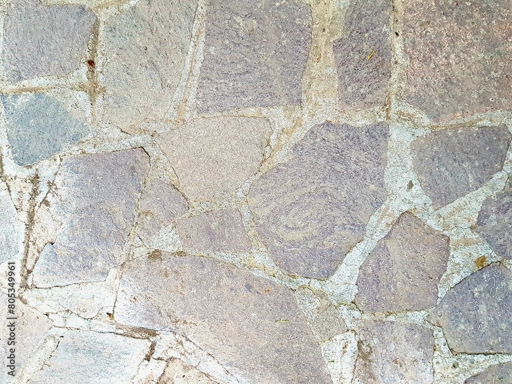Background of stone wall texture. Floor surface for design and decoration. Background of stone wall texture. Floor surface for design and decoration.