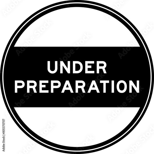 Black color round seal sticker in word under preparation on white background