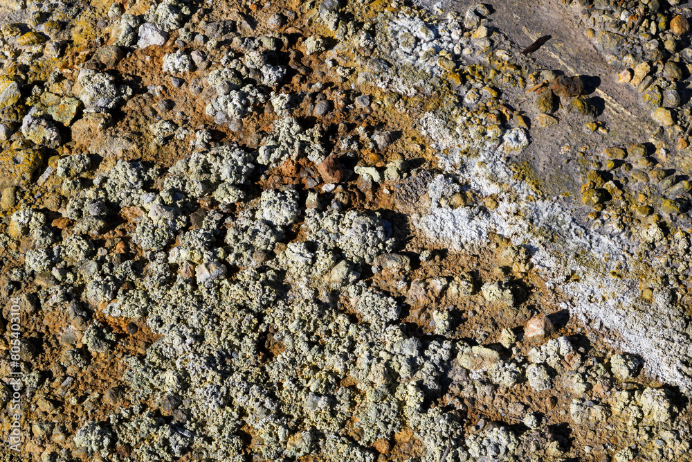 a close up to the volcanic thermal rocks and stones on the ground of Bumpass hell in lassen volcanic national park, califronia a close up to the volcanic thermal rocks and stones on the ground of Bumpass hell in lassen volcanic national park, califronia