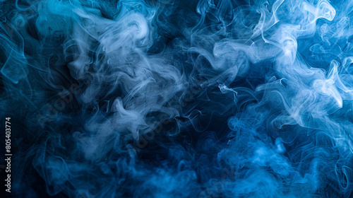 A mysterious and moody scene of smoke in shades of deep blue and gray, swirling in the darkness to create a sense of depth and intrigue.