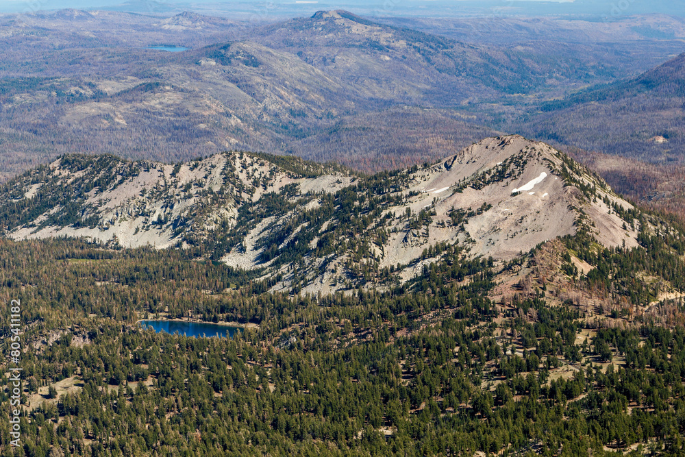 unique, breathtaking panoramic view on the top of the lassen mountain peak down into the valley at the national park, california