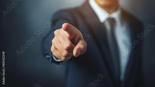 Business man points his finger at you, showing that everyone can succeed