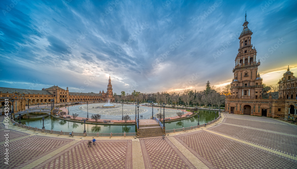 Fototapeta premium Stunning Twilight Scene at Historic Plaza de España with Reflective Waters, Seville, Spain