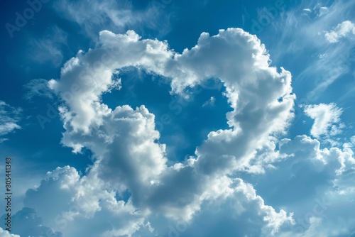 Picturesque heart shaped cloud on blue sunny sky, romance and love concept