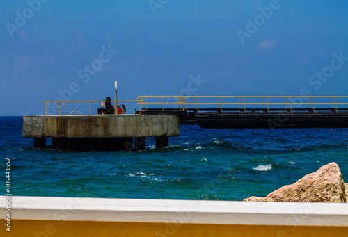 View of pier on the Caribbean Sea in Willemstad, Curaçao, photo