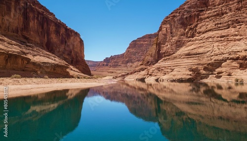 Beautiful lake. The river flows through the canyon, Sand mountains and clouds are reflected in the calm water surface. landscape with a lake. Nature, ecology, ecotourism