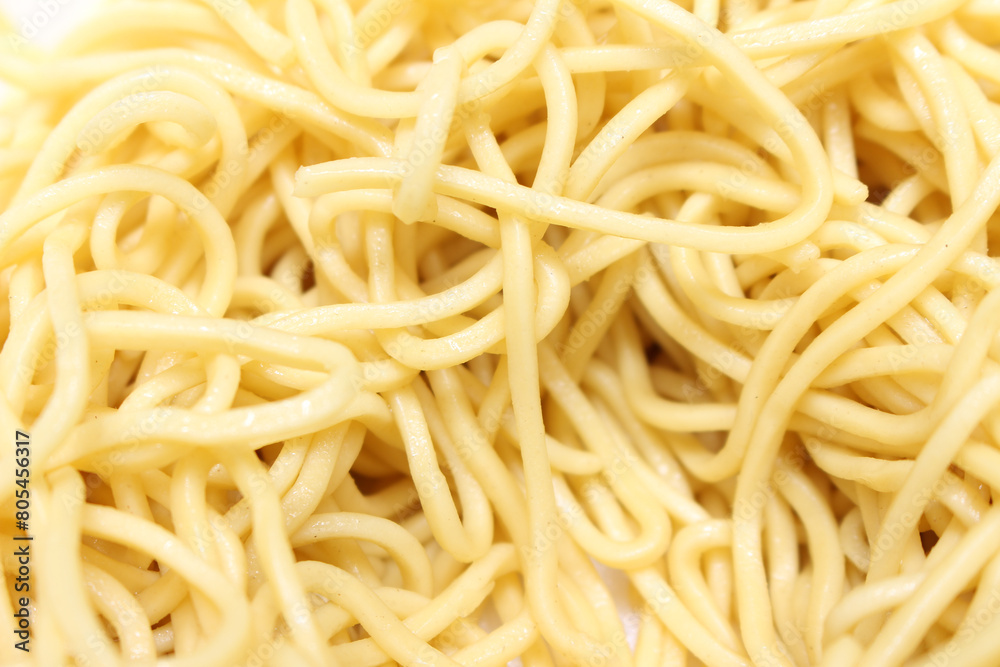 thin noodles. yellow dough background. food details. noodles with selective focus. thin noodles. yellow dough background. food details. noodles with selective focus.