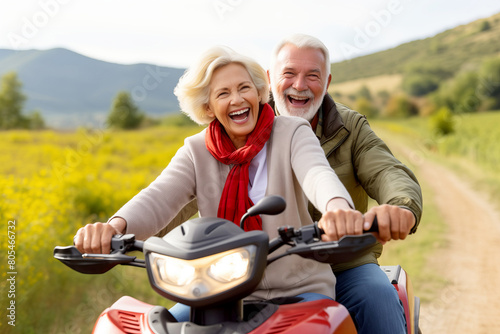 Happy Elderly Couple Traveling by squad bike in Countryside © Renata Hamuda