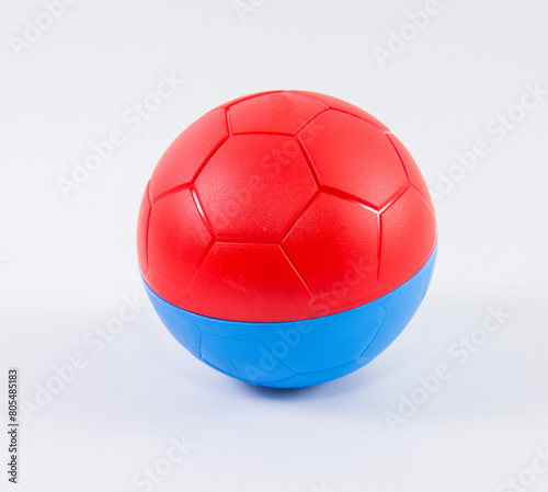 Red blue children's plastic ball on a white background.