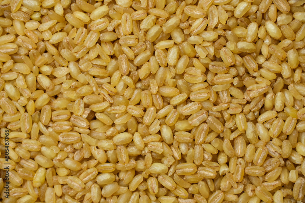 Heap of raw bulgur, close up. Healthy nutrition, vitamin cereals. Heap of raw bulgur, close up. Healthy nutrition, vitamin cereals.