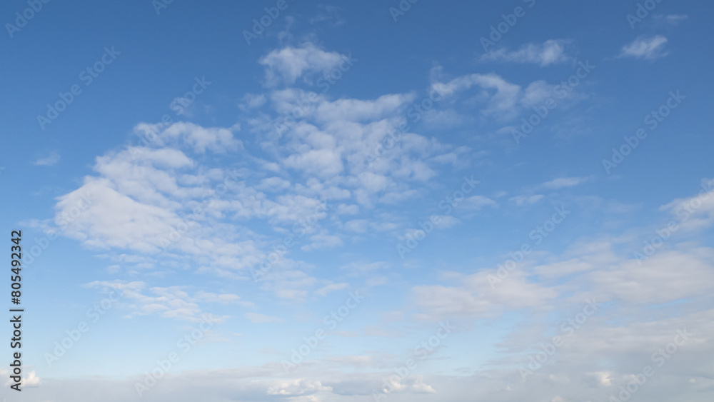 Sky. The clouds. Fluffy clouds in a blue sky. Landscape - nature