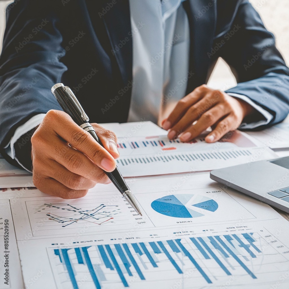 Professional Analysing Graphs and Charts - Financial Accountant studying Numbers - Business Audit - Finance Managers making up Balance - Analyst working at a Desk - Data Strategy - Stockbroker Professional Analysing Graphs and Charts - Financial Accountant studying Numbers - Business Audit - Finance Managers making up Balance - Analyst working at a Desk - Data Strategy - Stockbroker