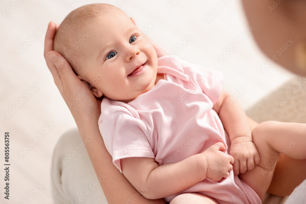 Mother with her cute little baby at home Mother with her cute little baby at home