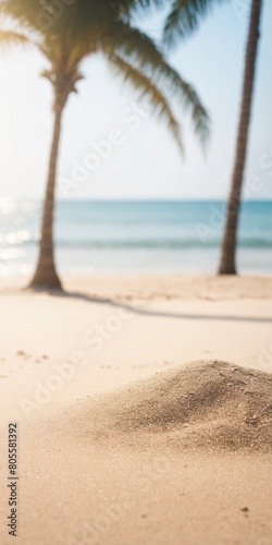 Sand with blurred Palm and tropical beach bokeh background Summer vacation and travel concept