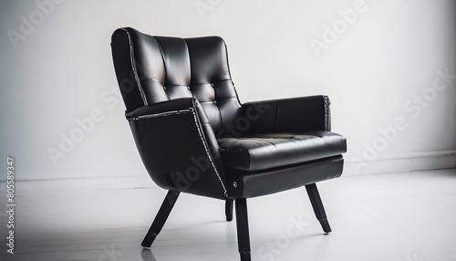 a sleek black leather club chair with armrests and a rectangular shape ideal for both indoor and outdoor furniture the chair sits on a white background exuding elegance and sophistication photo