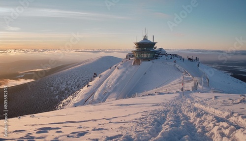 first snow in november in karkonosze mountains sunrise in sniezka peak the highest mountain in sudety range photo