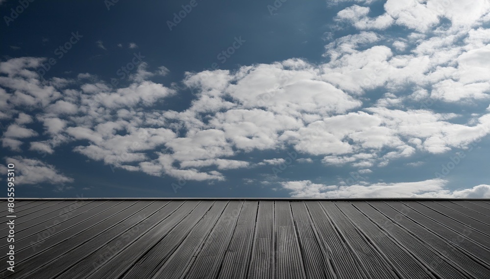 black floor dark background with gray sky and white clouds