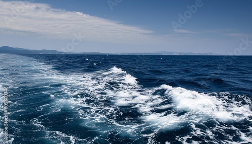 dark blue sea surface with waves splash