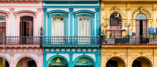 Beautiful colorful buildings line the cobblestone streets of Havana's Old Town, showcasing colonial architecture. © Szalai