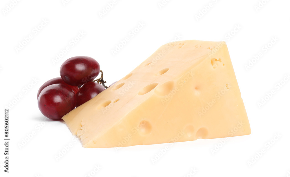 Piece of delicious cheese and grapes isolated on white Piece of delicious cheese and grapes isolated on white
