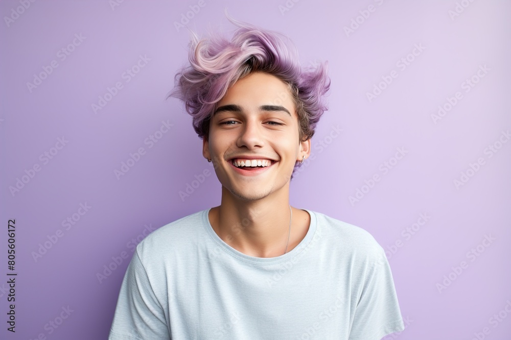 A young man with purple hair is smiling and wearing a white shirt A young man with purple hair is smiling and wearing a white shirt